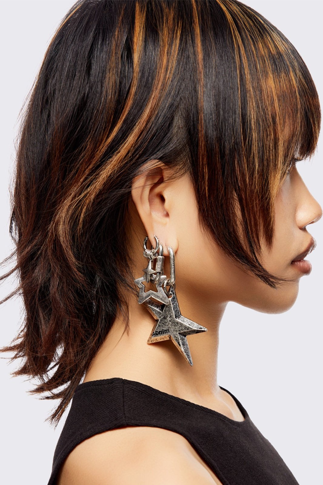 Silver 4pc chunky earring set featuring a mixed textures and bold shapes with star pendants.