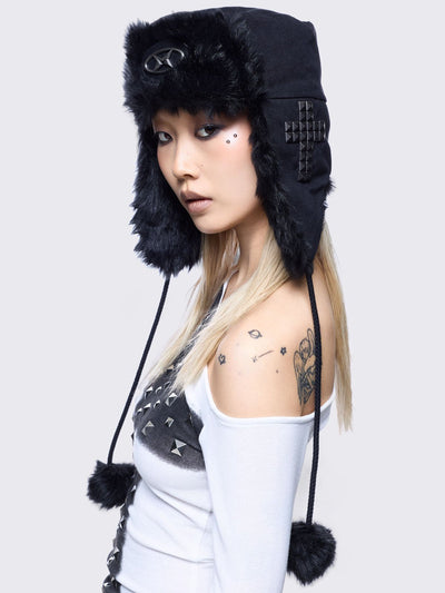 Black faux fur trim trapper hat with studded cross