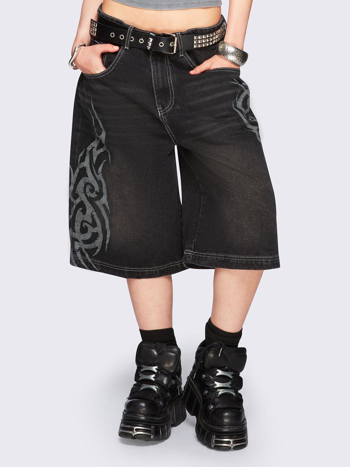 Black washed longline denim jorts with grey sigilism tattoo prints on side and back.