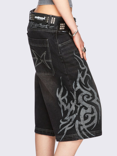 Black washed longline denim jorts with grey sigilism tattoo prints on side and back.