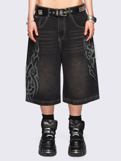 Black washed longline denim jorts with grey sigilism tattoo prints on side and back.