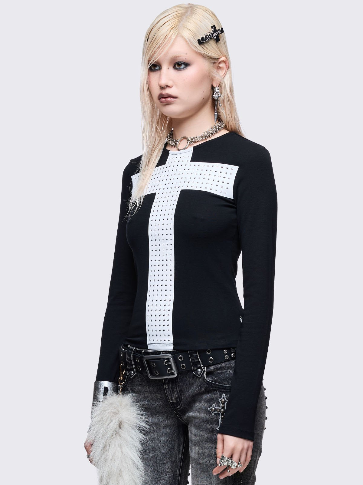 Black long sleeve top with white chunky cross with silver studs