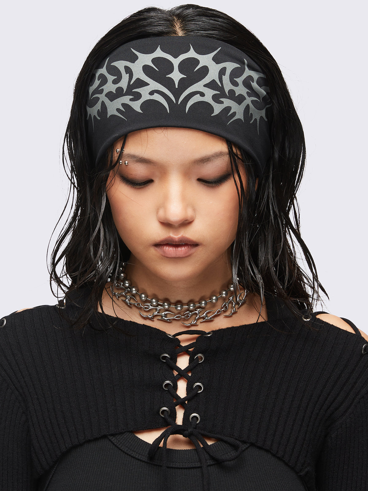 Black headband with cyber sigilism heart tattoo print.