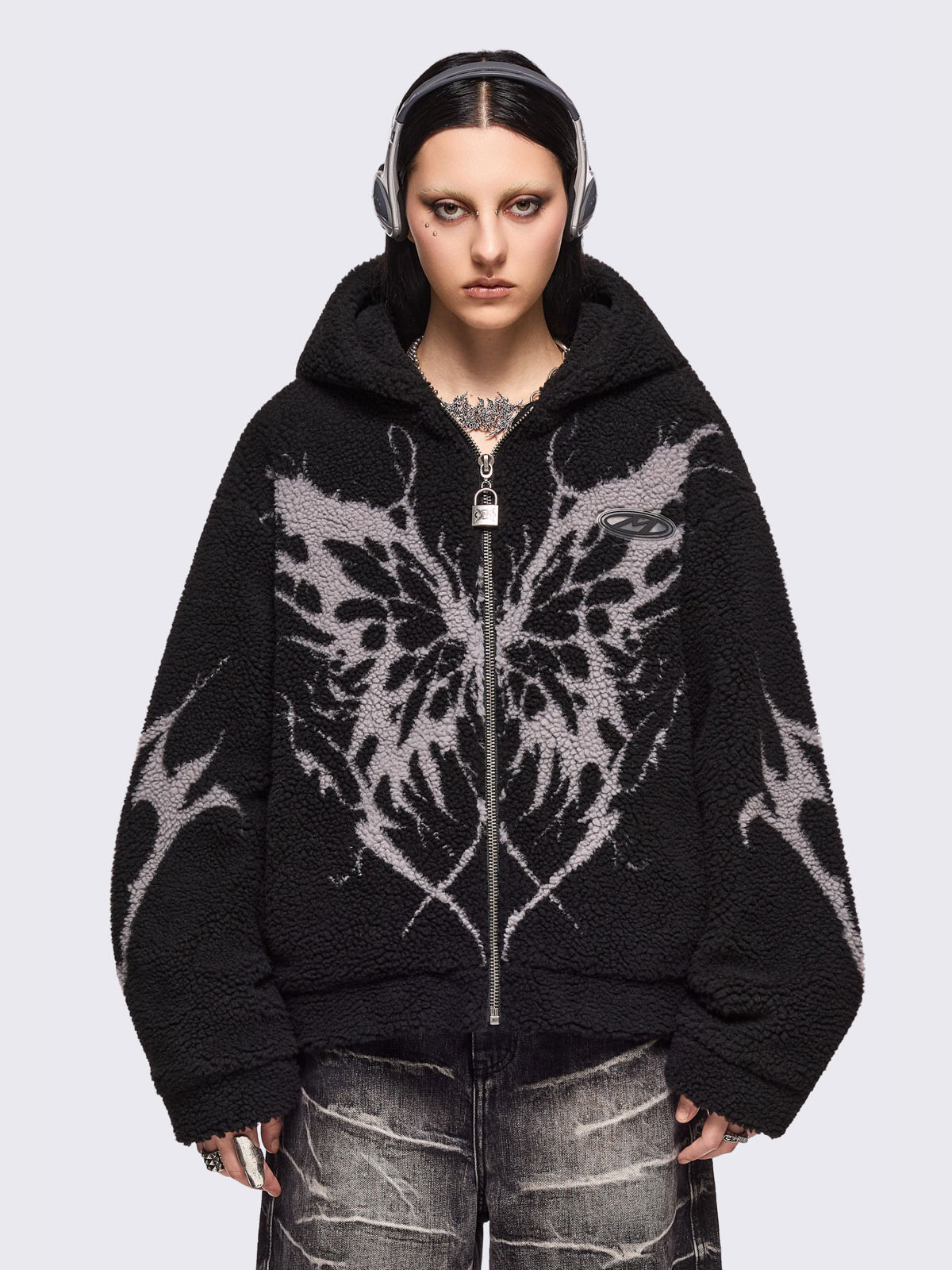 Black fleece hoodie jacket featuring a grey dark butterfly sigil design.