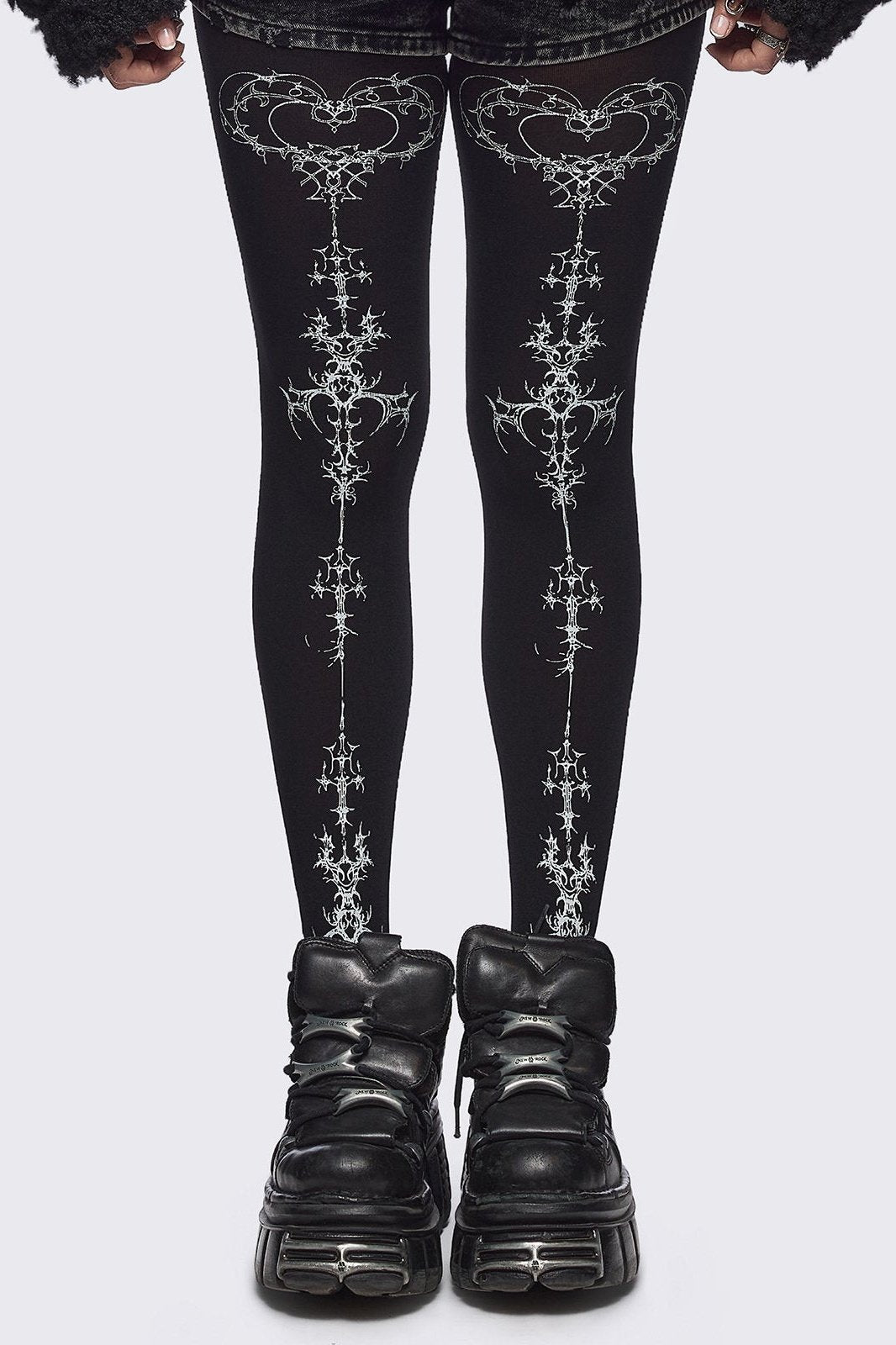 Black opaque tights with white sigilism print.
