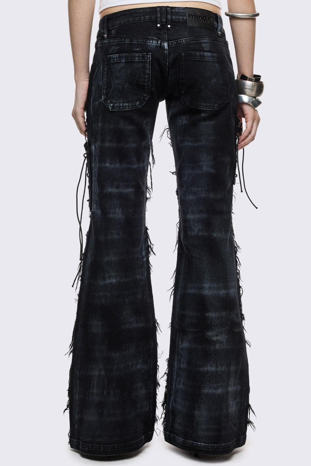Black Flare Jeans With Distressed Frayed Details | Minga London