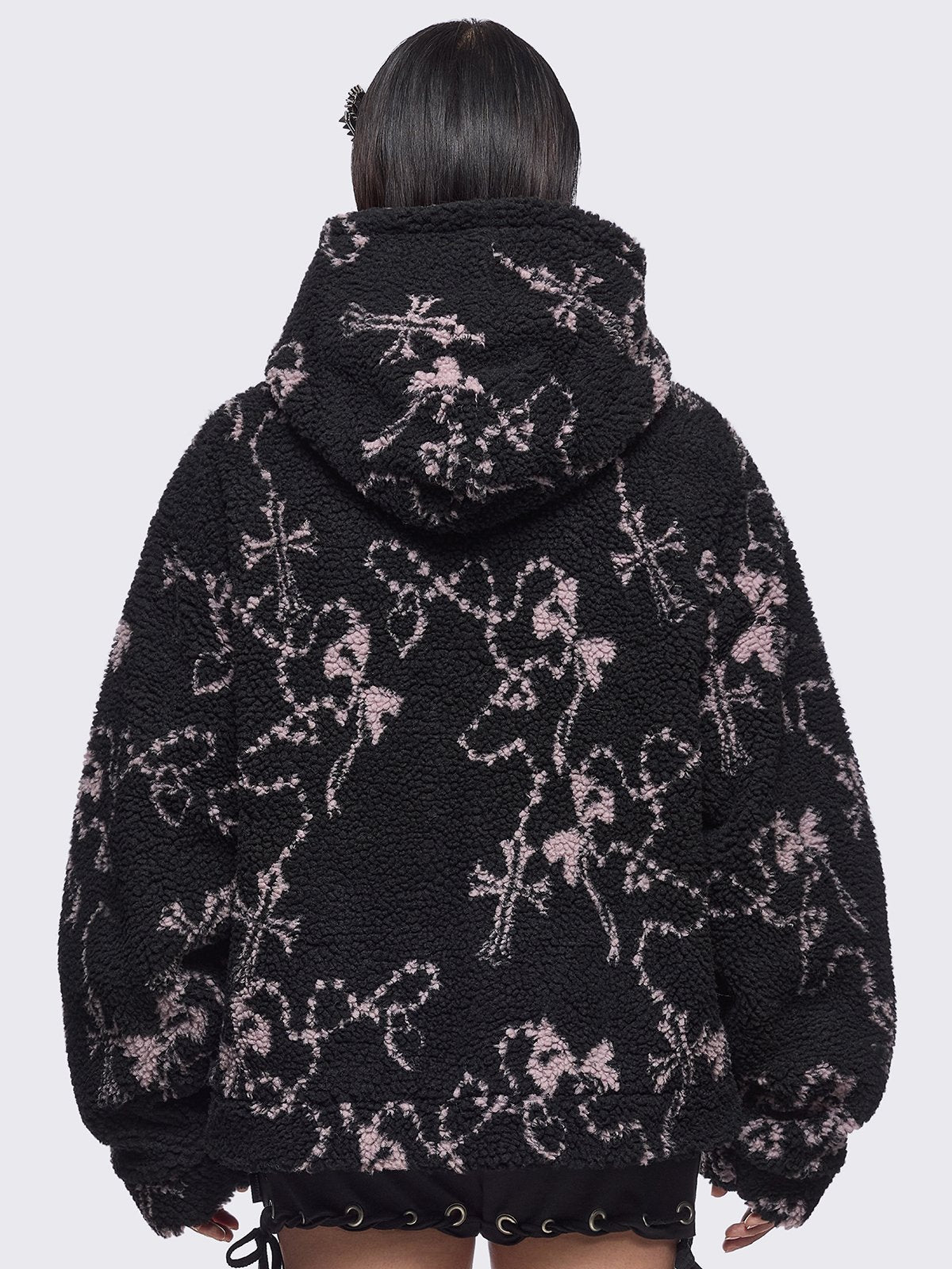Black fleece borg hoodie jacket featuring all over pink rosary designs.