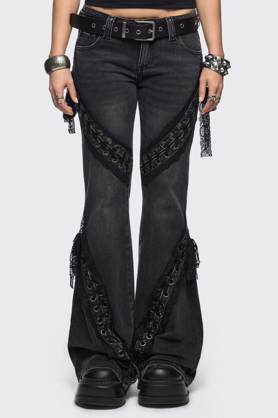Black washed flare jeans with lace up bow details.