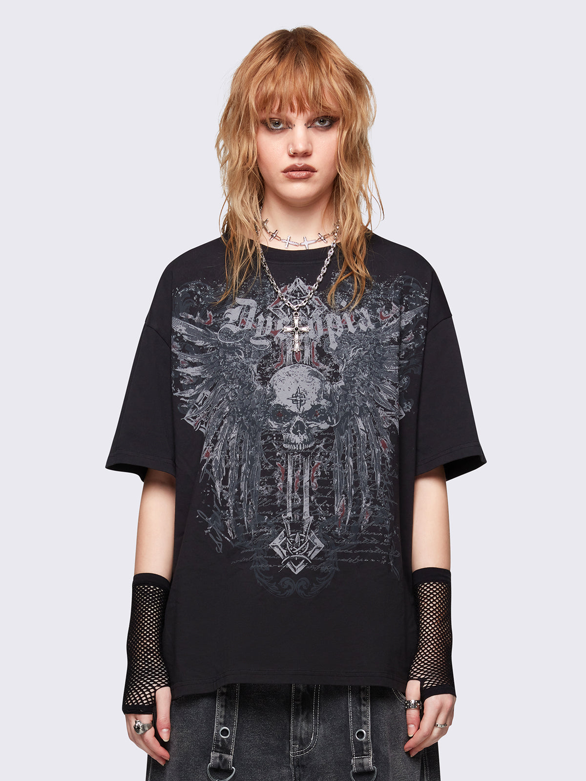 Black graphic t-shirt with "Dystopia" winged skull graphic front print. Relaxed oversize fit style.