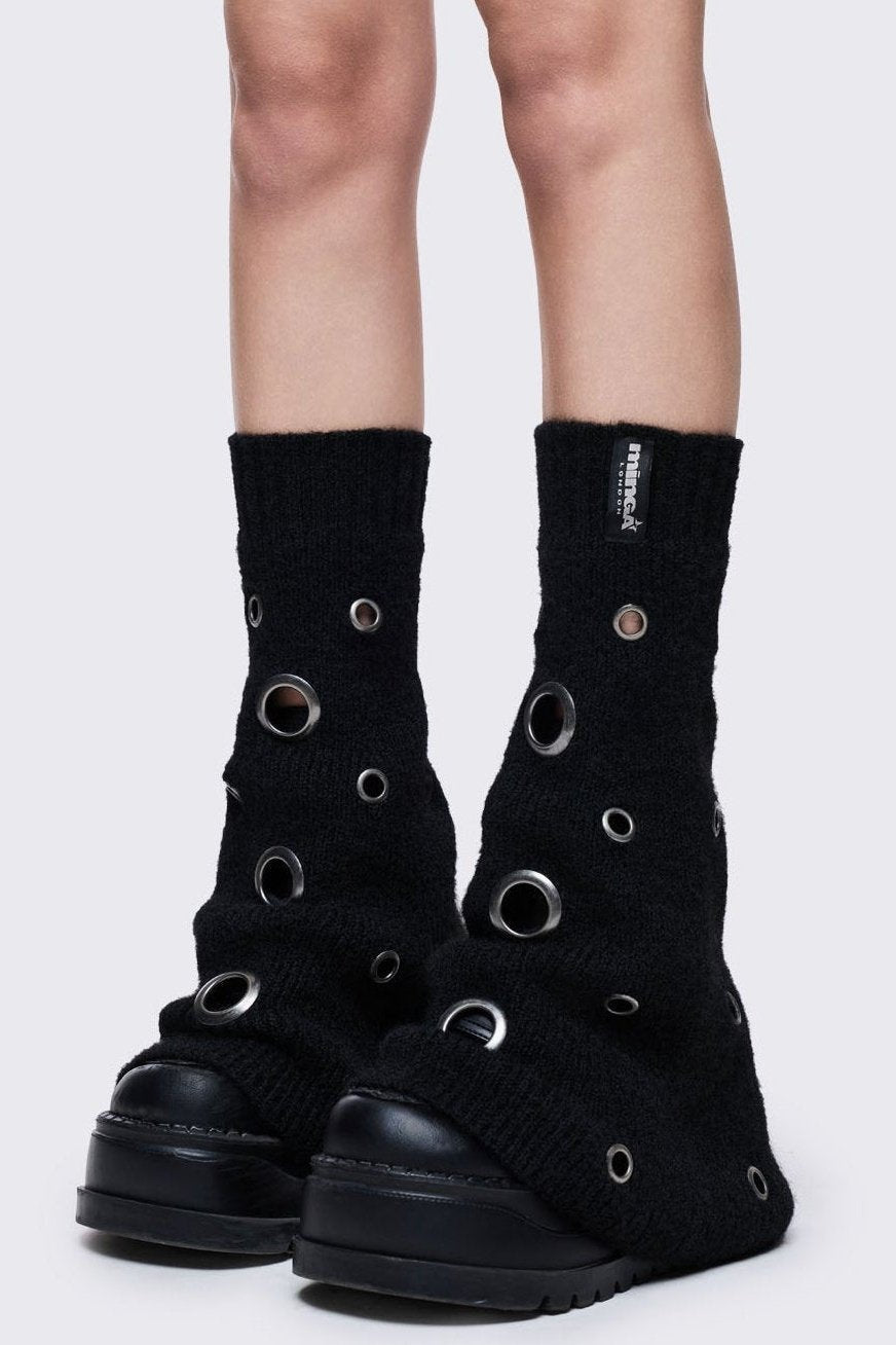 Black knitted flare leg warmers with chunky silver eyelets