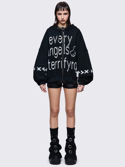 Black knitted flare leg warmers with chunky silver eyelets