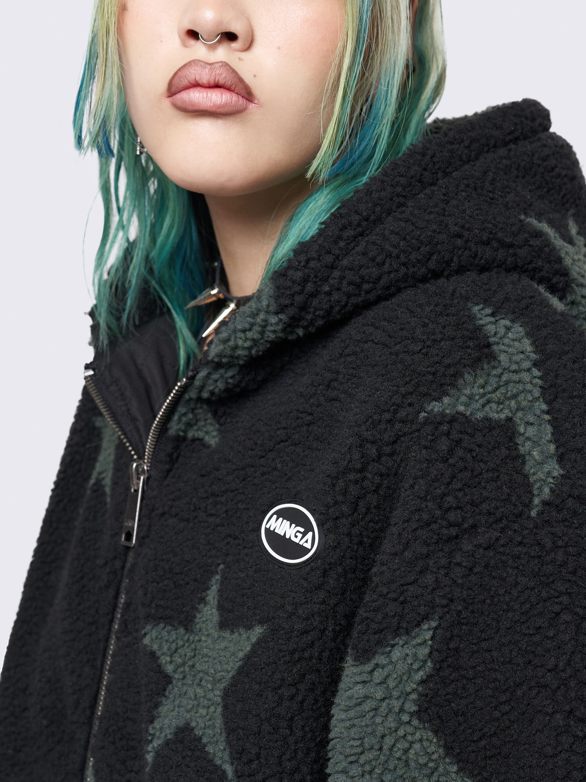 Fleece hoodie borg jacket in black with all over stars design in green