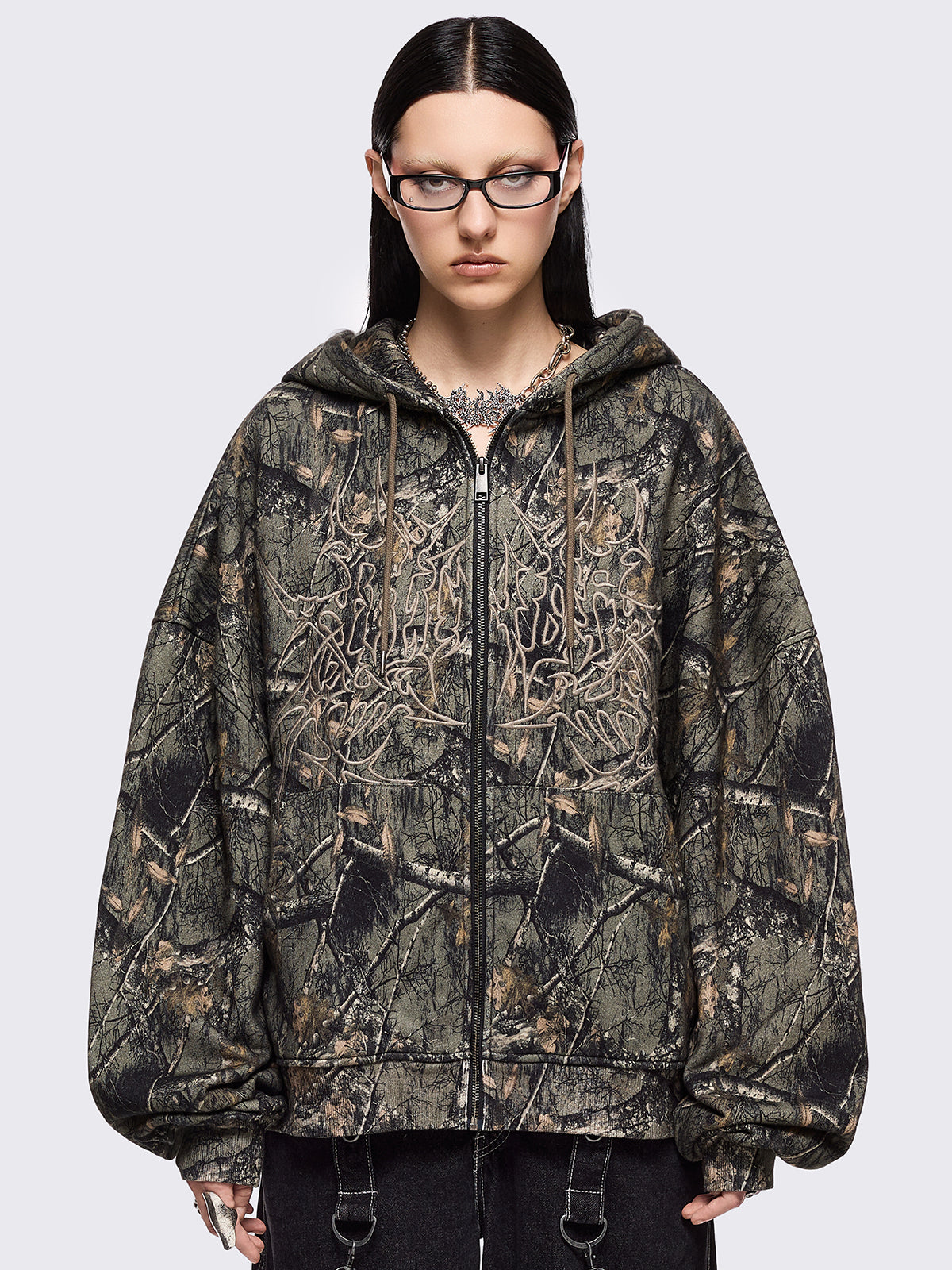 Forest tree camo print zip up hoodie jacket with sigilism graphic front embroidery.
