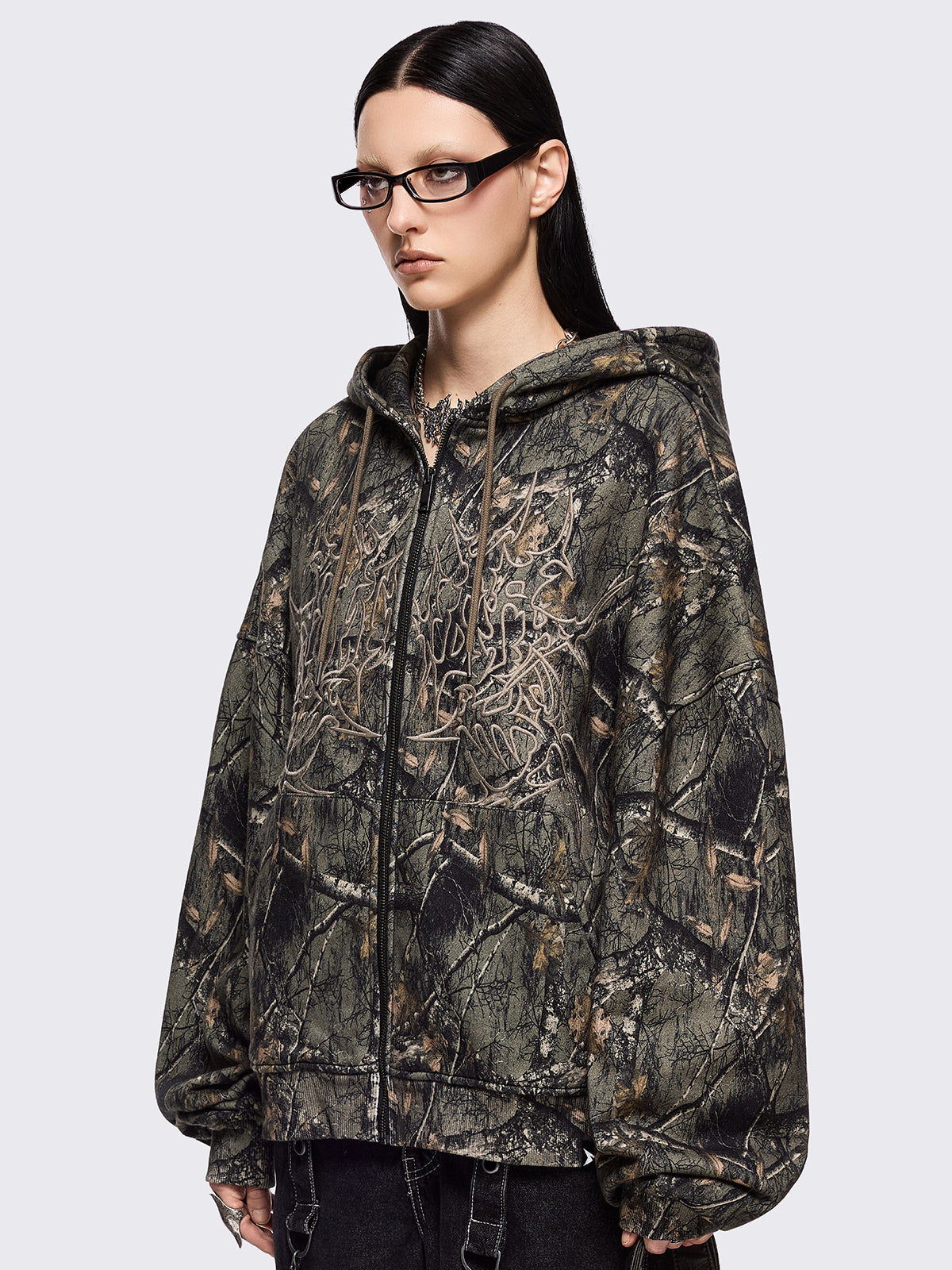 Forest tree camo print zip up hoodie jacket with sigilism graphic front embroidery.