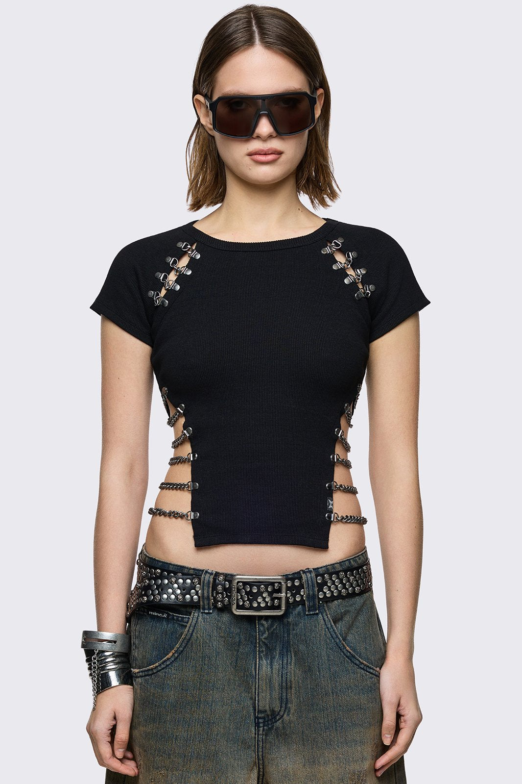 Black ribbed baby tee with cut-outs with silver clasp hardware and side opening with silver curb chain hangings