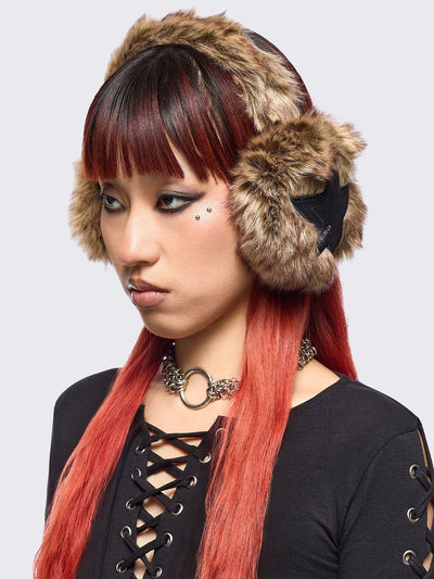 Faux fur earmuffs in beige and brown featuring stars embroidered patch in black.