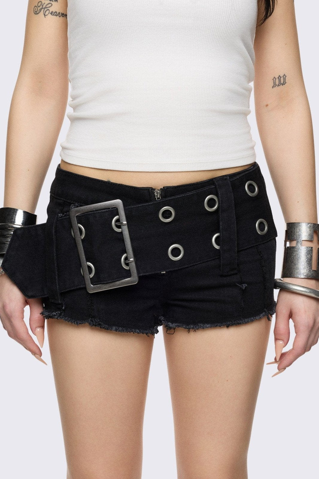 Black denim hot pants with chunky buckle belt.