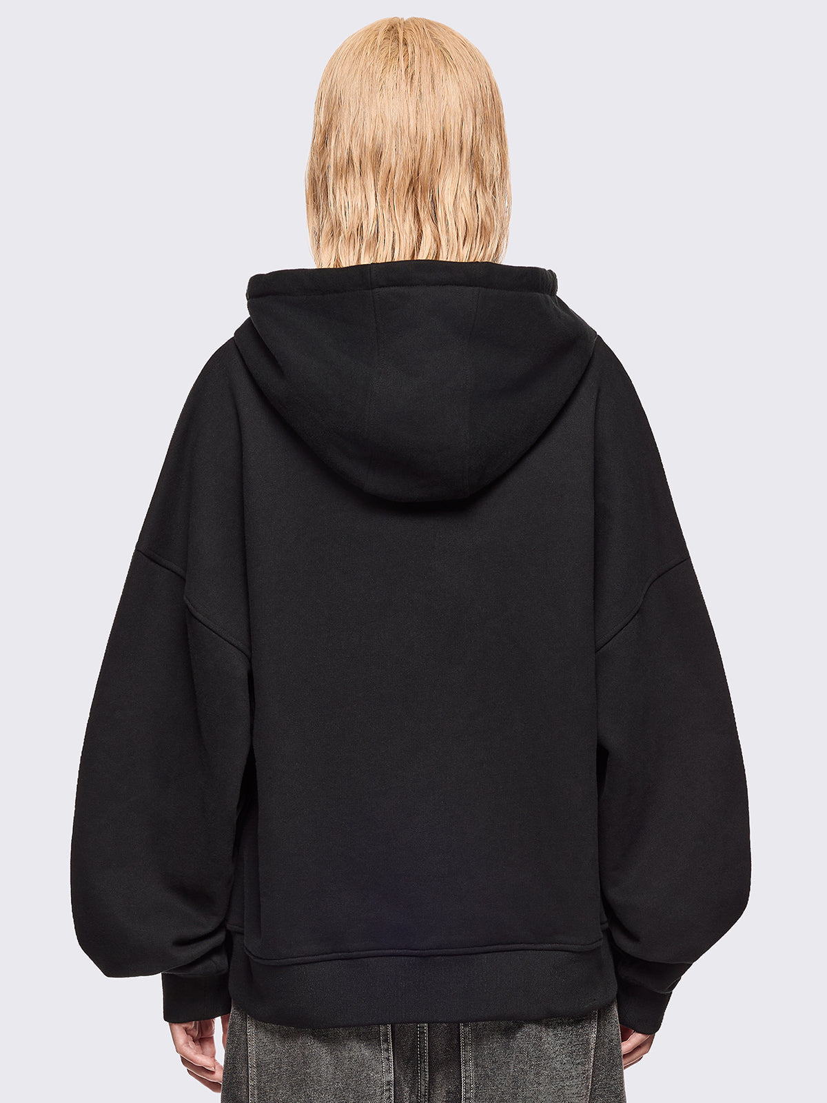 Black zip up hoodie jacket featuring a kaomoji ASCII-style embroidery in white.