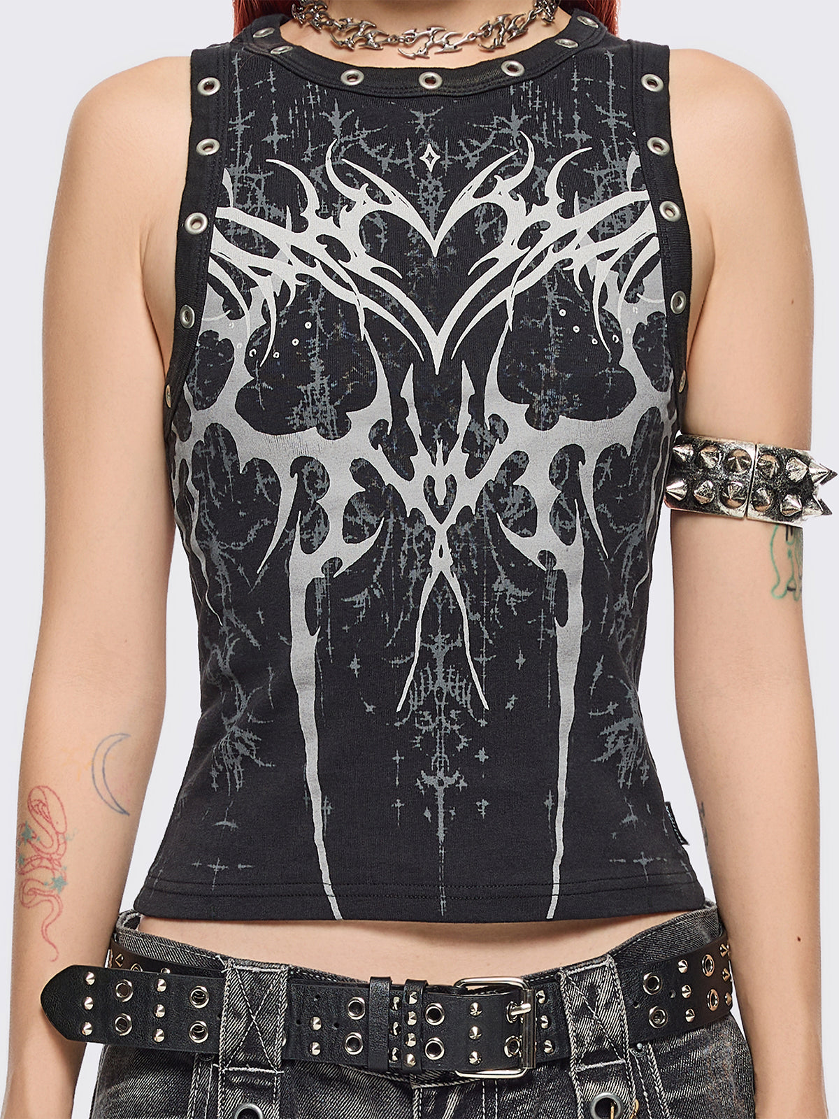 Black tank top with sigilism heart front print and eyelet trim details.