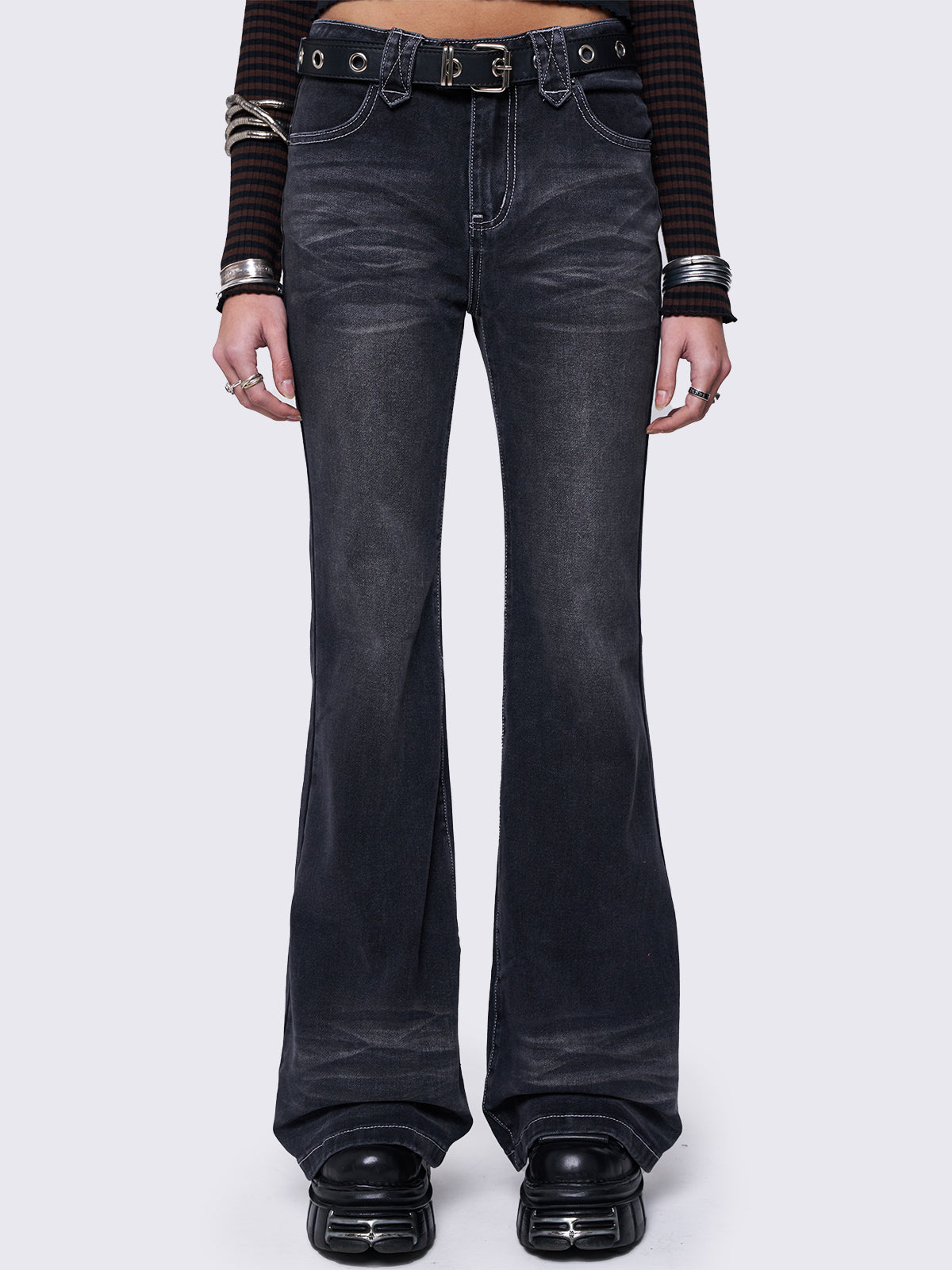 Flared overdye jeans in washed black.