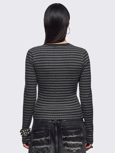 Black and grey striped ribbed long sleeve top featuring a half button placket.