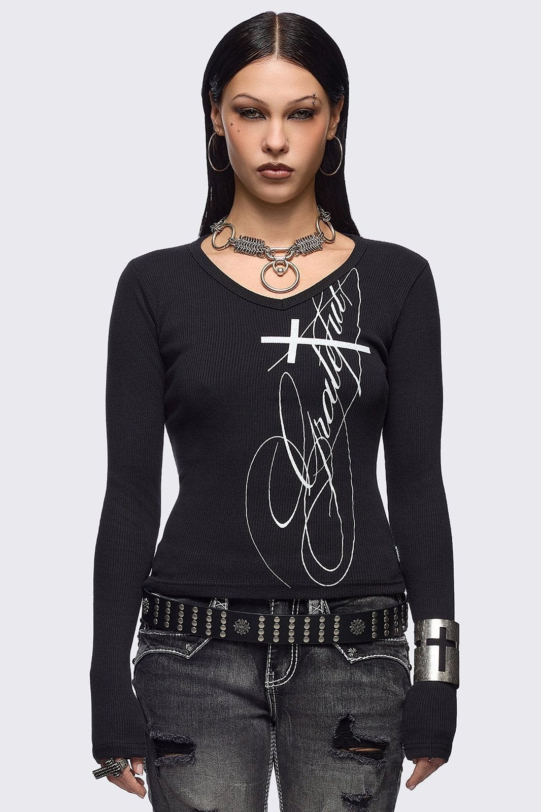 Black ribbed long sleeve top featuring "Grateful" cross graphic front print and v-neck.
