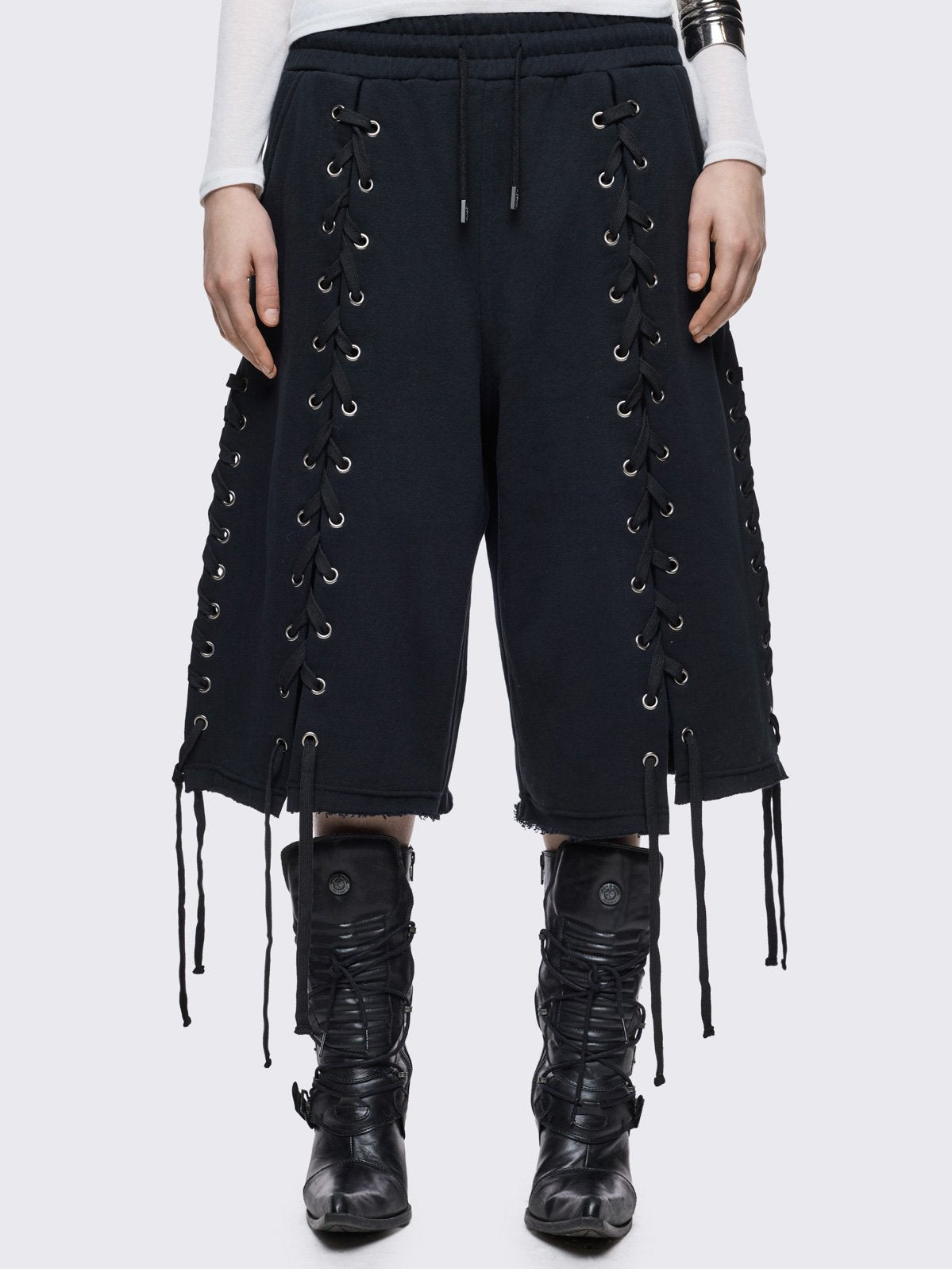 Black longline sweat shorts with open lace-up corset details