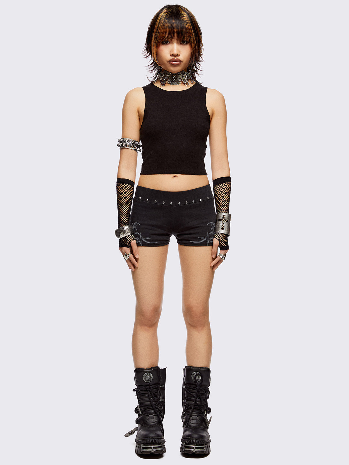 Black sweat shorts hot pants with silver studded waistline and sigilism graphic side print.