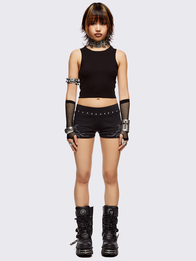 Black sweat shorts hot pants with silver studded waistline and sigilism graphic side print.