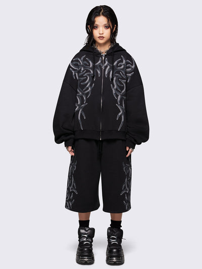 Black oversized zip up hoodie jacket with sigilism graphic front print.