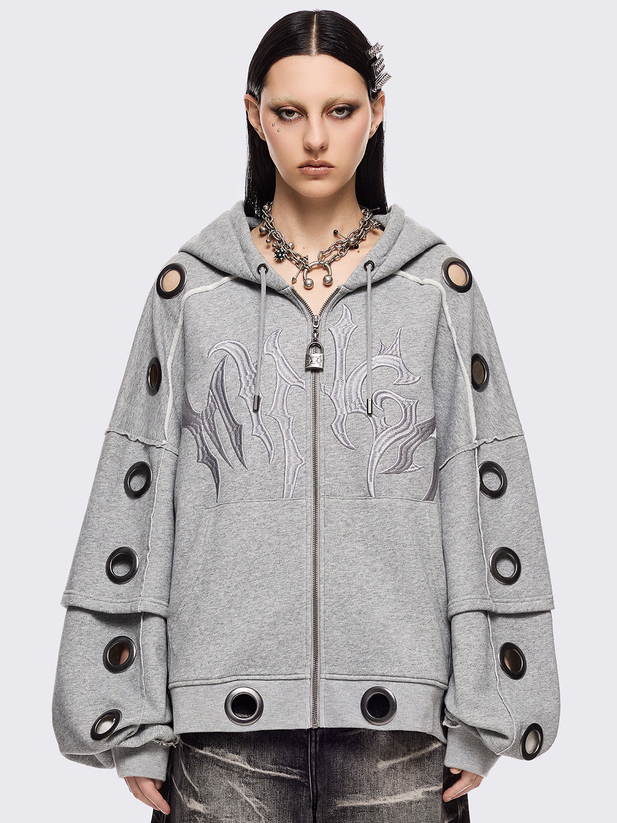 Grey marl layered zip up hoodie featuring chunky silver eyelets and raw edge seam details.