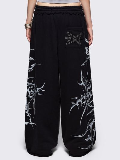 Black wide leg sweatpants with off-white sigilism graphic side print.