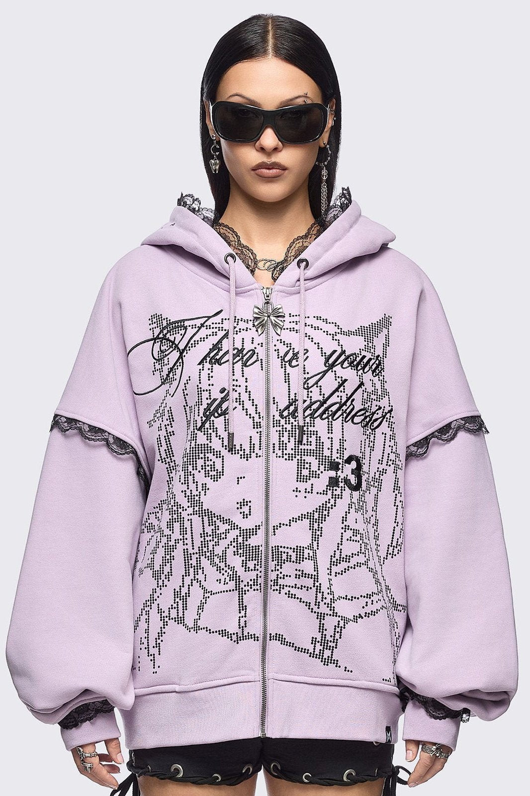 Pink zip up hoodie jacket with "I have your IP address" embroidery, anime girl ASCII-style graphic print and black lace seam details.