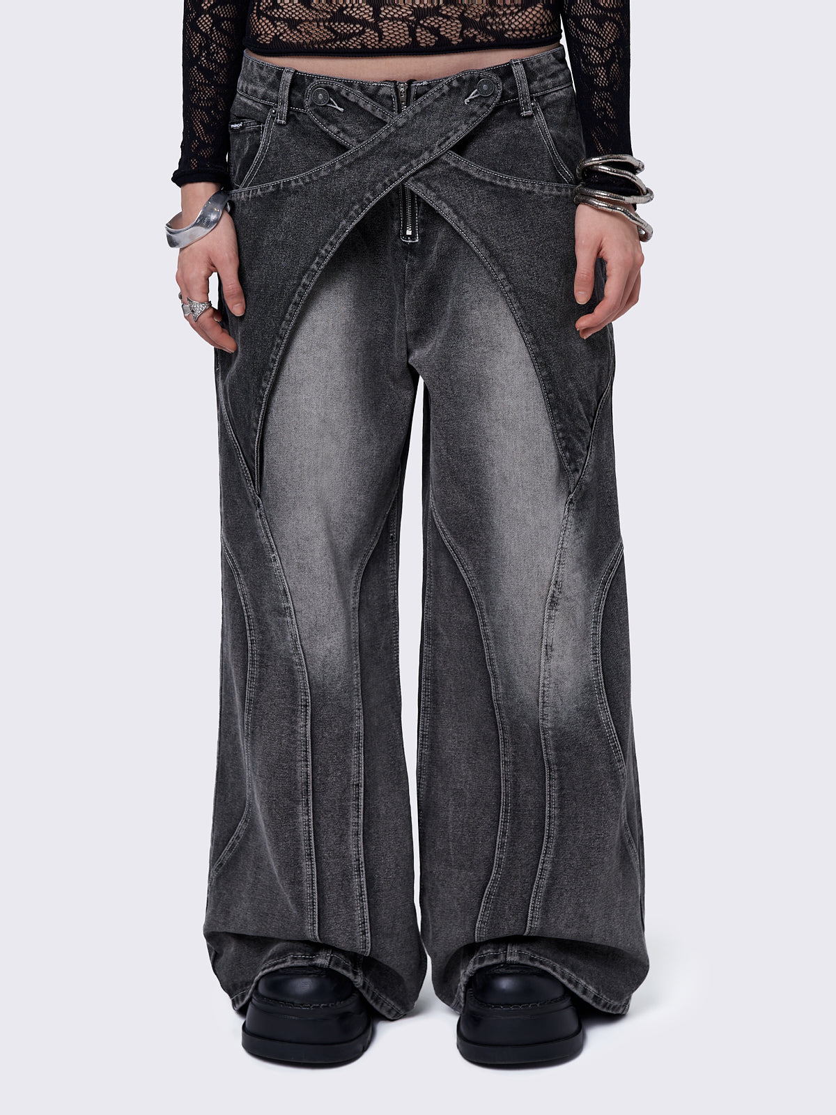 Black washed baggy jeans with grey overdye and cross panels and seams details. 