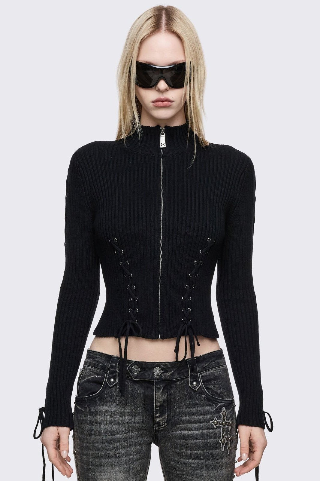 Black zip up cardigan with lace-up corset details. 