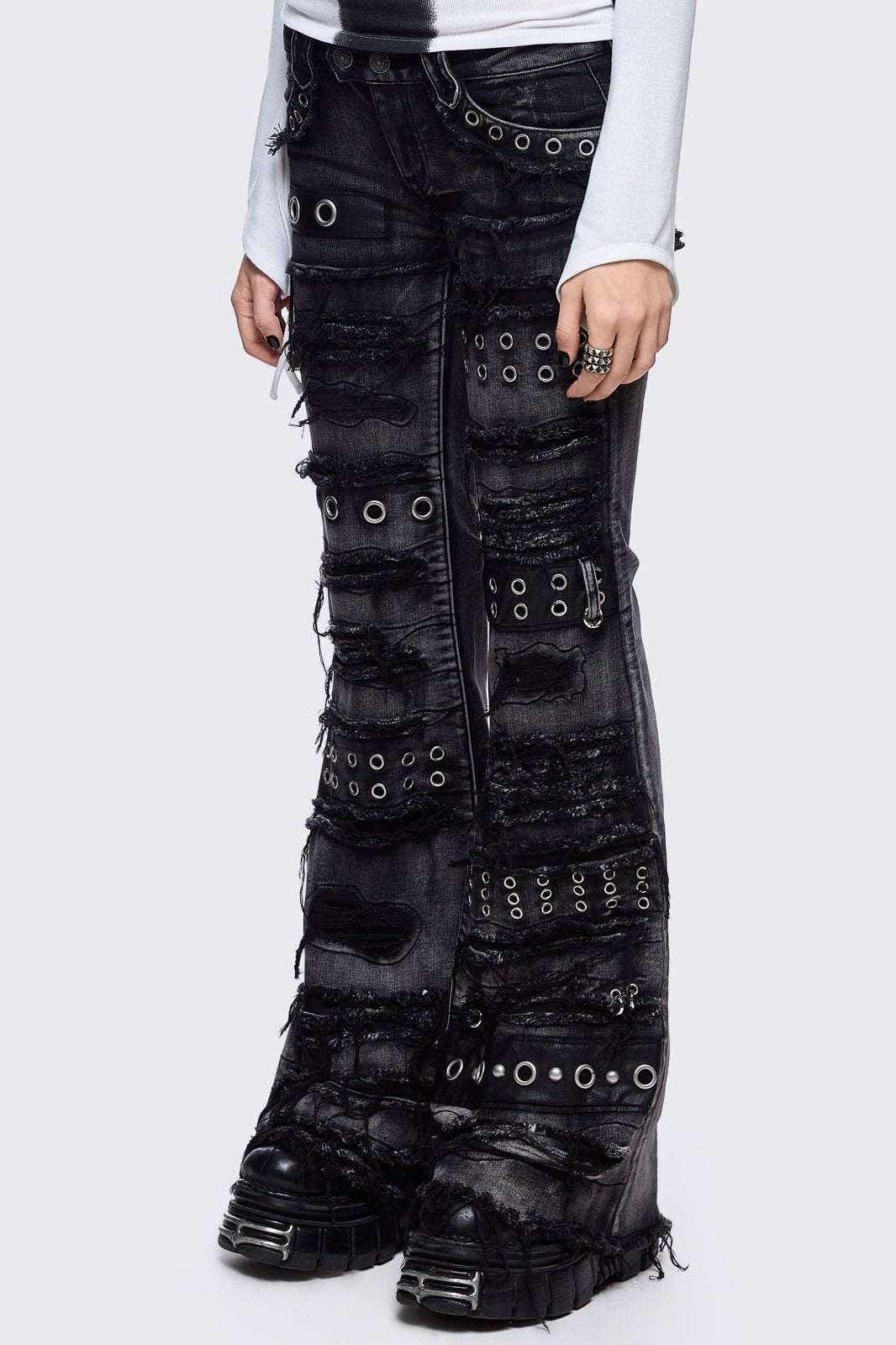 Flared Distressed Jeans with Shredded, Eyelets and Studs | Minga