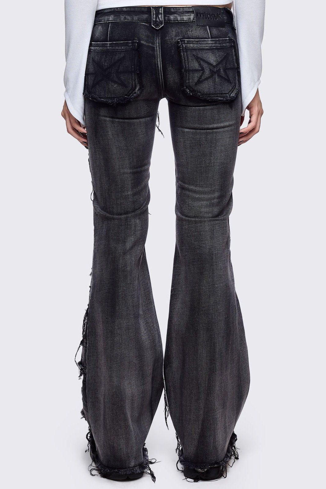 Flared Distressed Jeans with Shredded, Eyelets and Studs | Minga