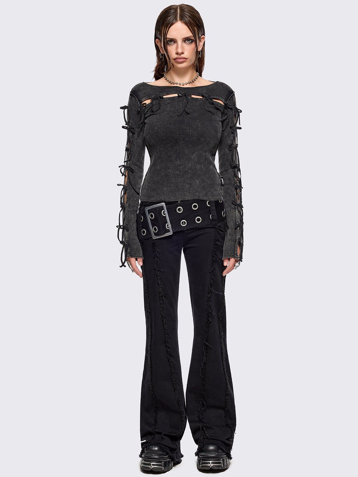 Black washed rib top with cut-out and bow details.