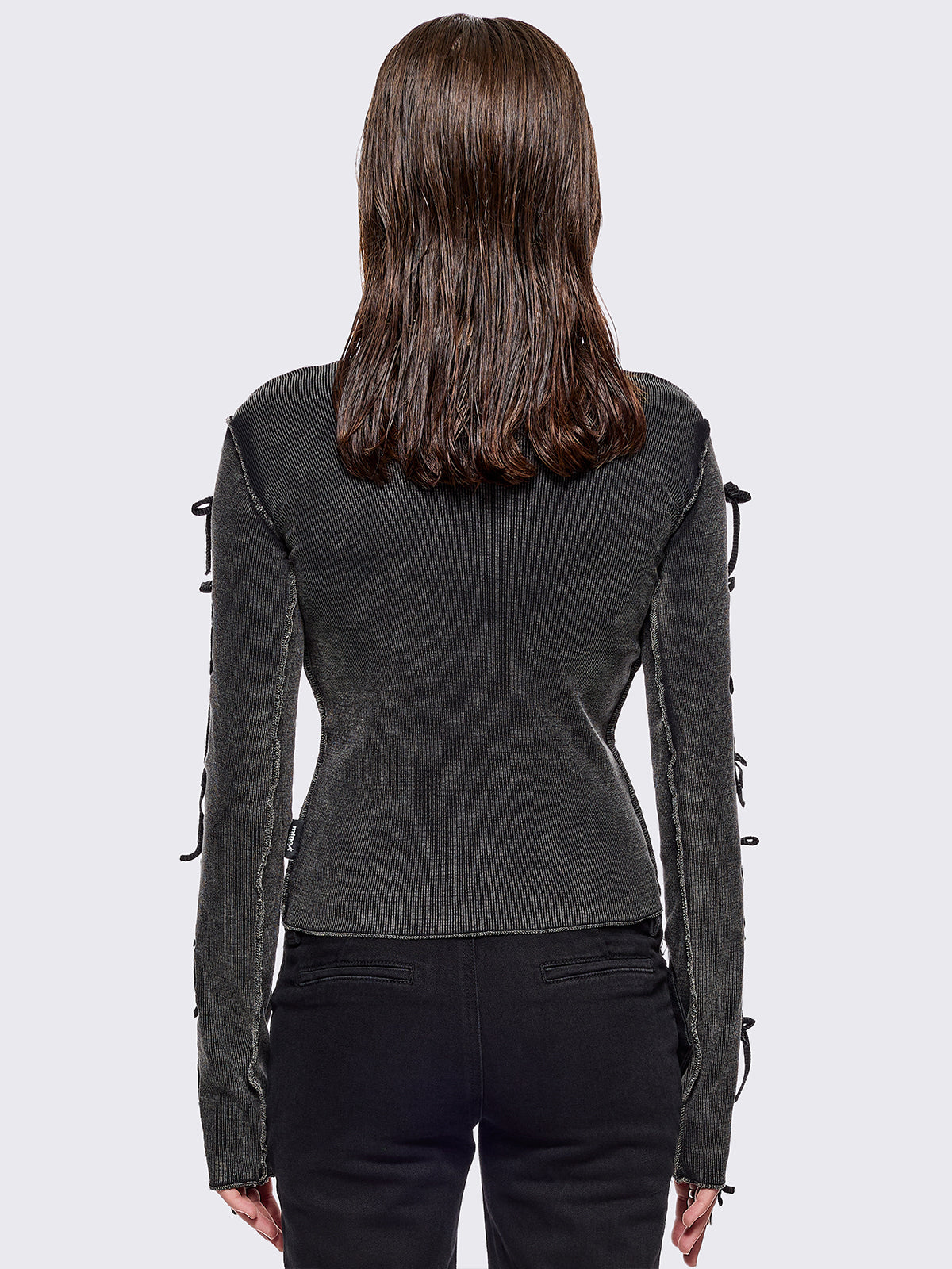 Black washed rib top with cut-out and bow details.