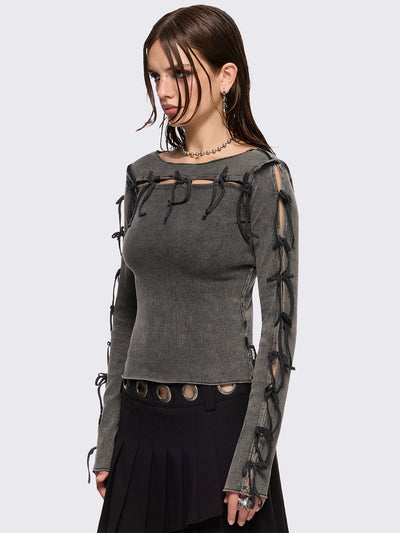 Grey washed rib top with cut-out and bow details.