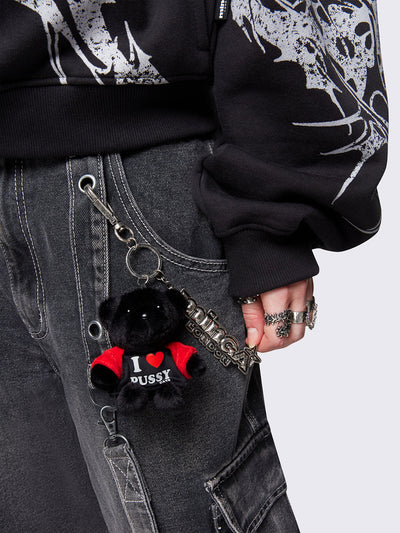 Clasp keychain with black plush teddy bear and Minga metal plate.