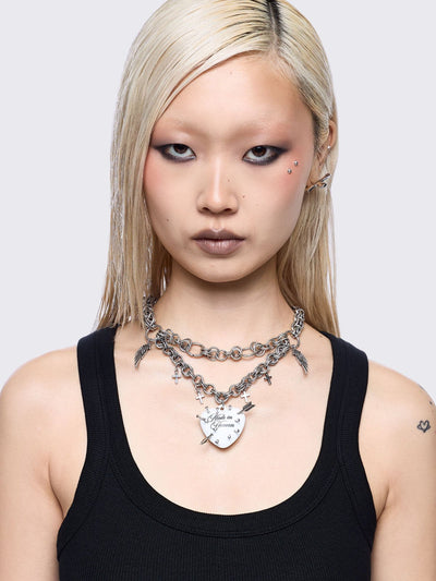 Two-layered silver chain necklace with a gothic aesthetic.