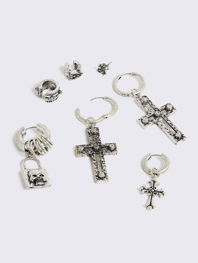Silver 7pc earring set featuring cross pendants and more styles.