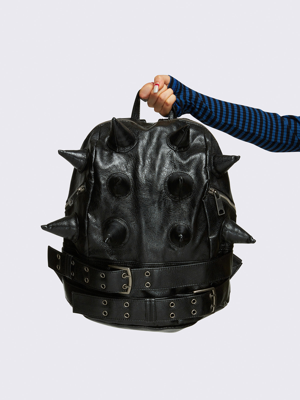 Vegan leather backpack in black with 3D spikes and buckles details