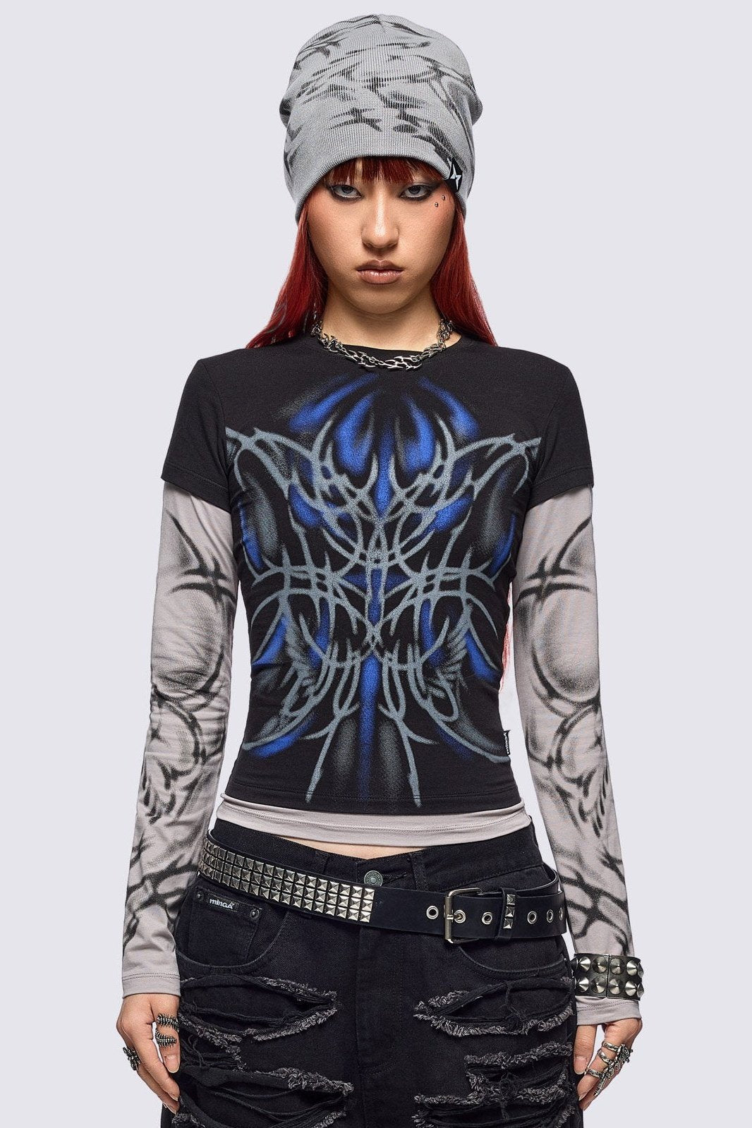 Black layered long sleeve top with grey contrast sleeves featuring a graphic print by cold𝐹33t designer.