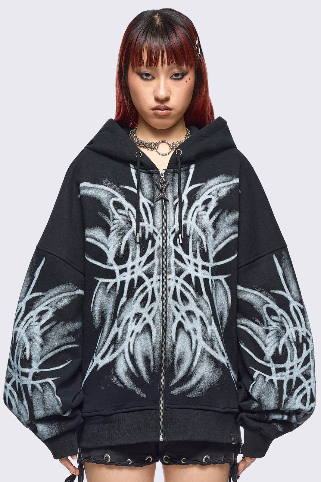 Black zip up hoodie jacket with graphic front and sleeves print by coldfeet designer.