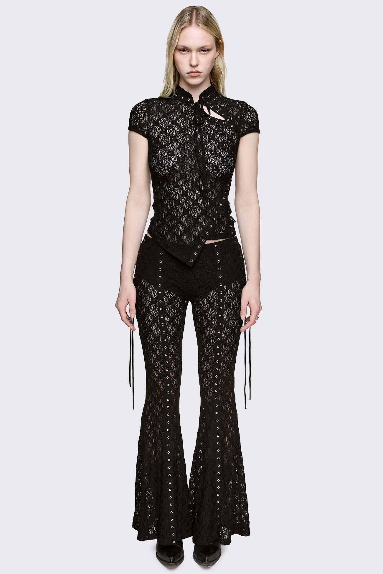 Black sheer lace flare pants with eyelet trims, side lace-up details and low waist in a goth vibe.