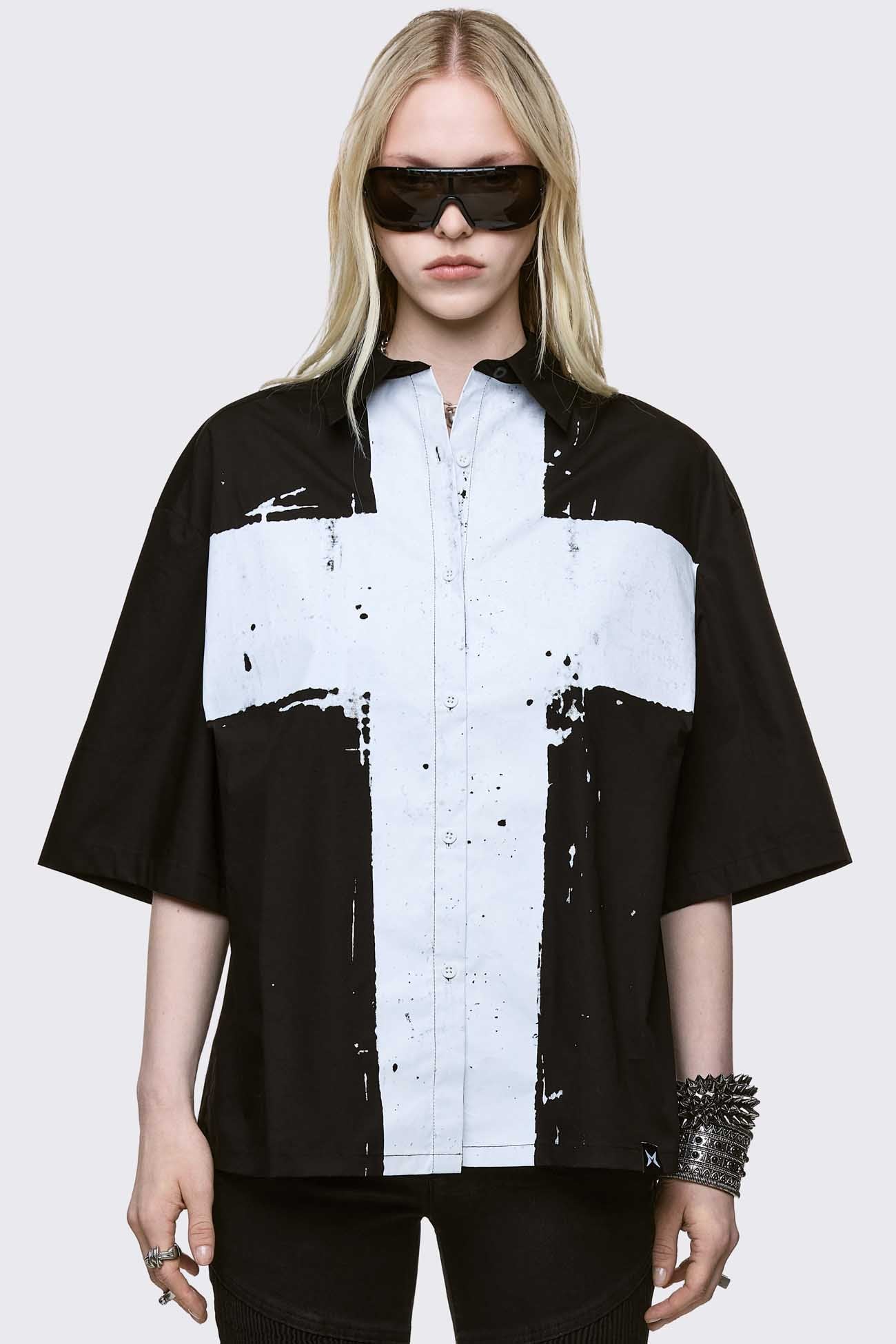 Black short sleeve with chunky white cross print.