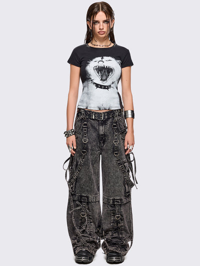 Black graphic baby tee with goth cat graphic print and piercing O-ring details on neckline.