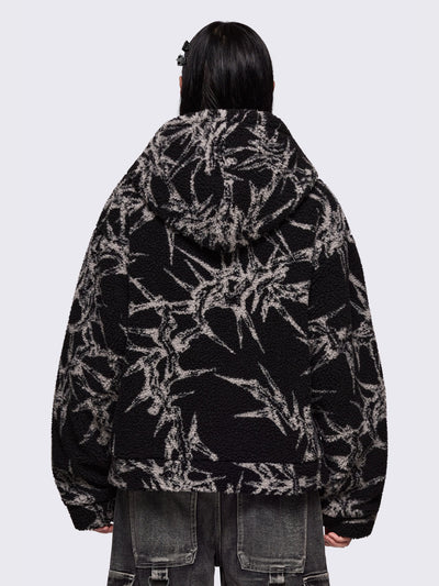 Black fleece borg hoodie jacket featuring all over grey thorns design.